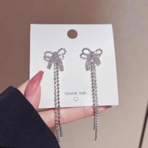 Élan bow tassel earrings